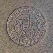 blind debossed college seal on leather diploma cover